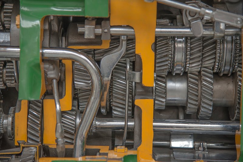 Cutaway view of a manual gearbox showing its gear clusters and shafts